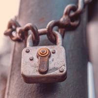 Lock and chain locked around a pole - 'Trusting Standards'
